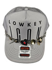 Lowkey Icon Silver Charm Trucker Hat