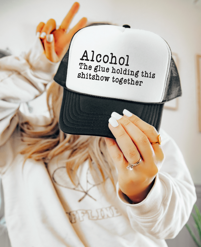 Alcohol holding it together Trucker Hat